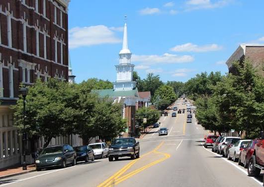 Downtown Greeneville, Tennessee street with church steeple and storefronts