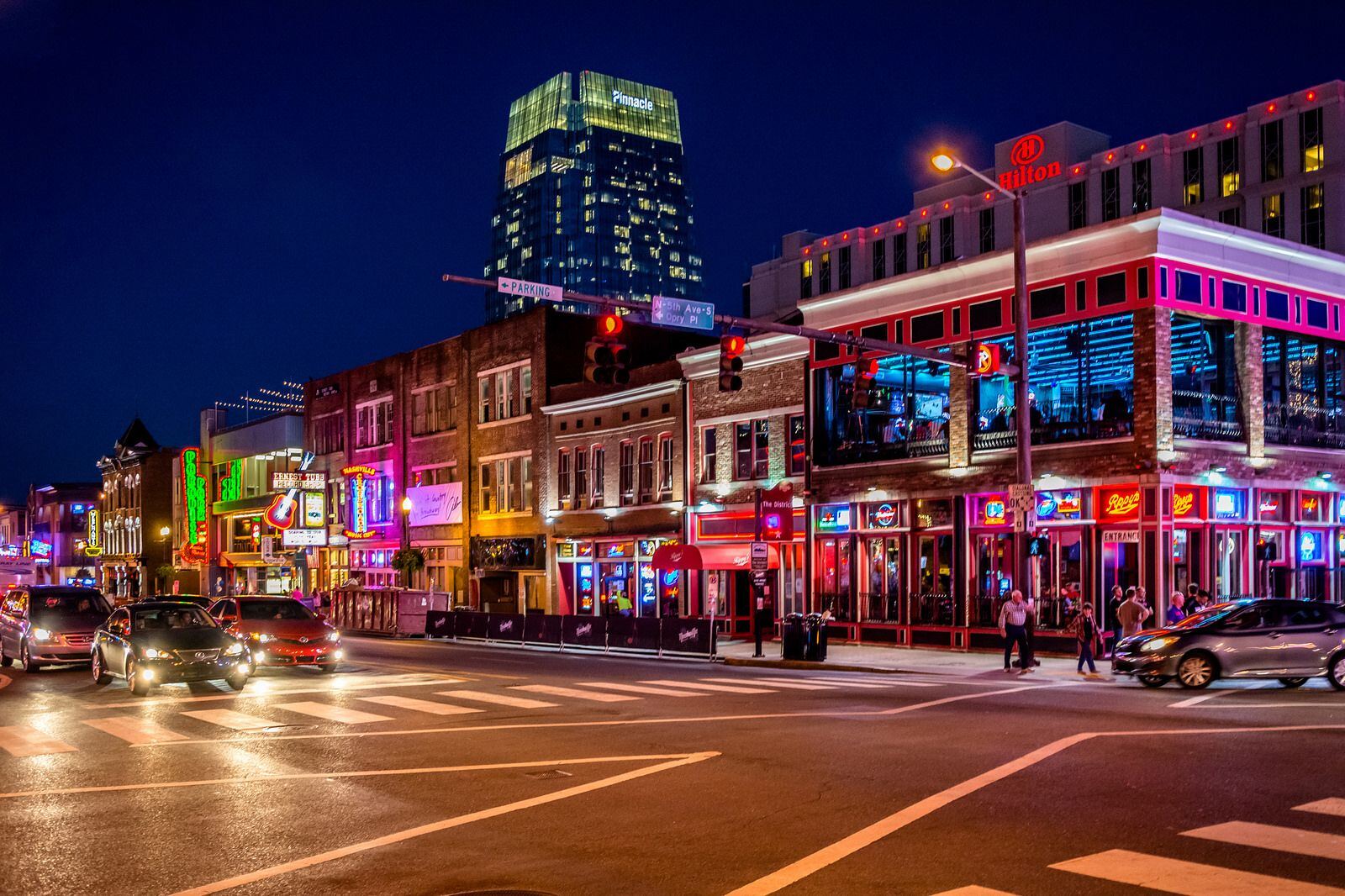 Night street scene in Jefferson City area with bright downtown lights