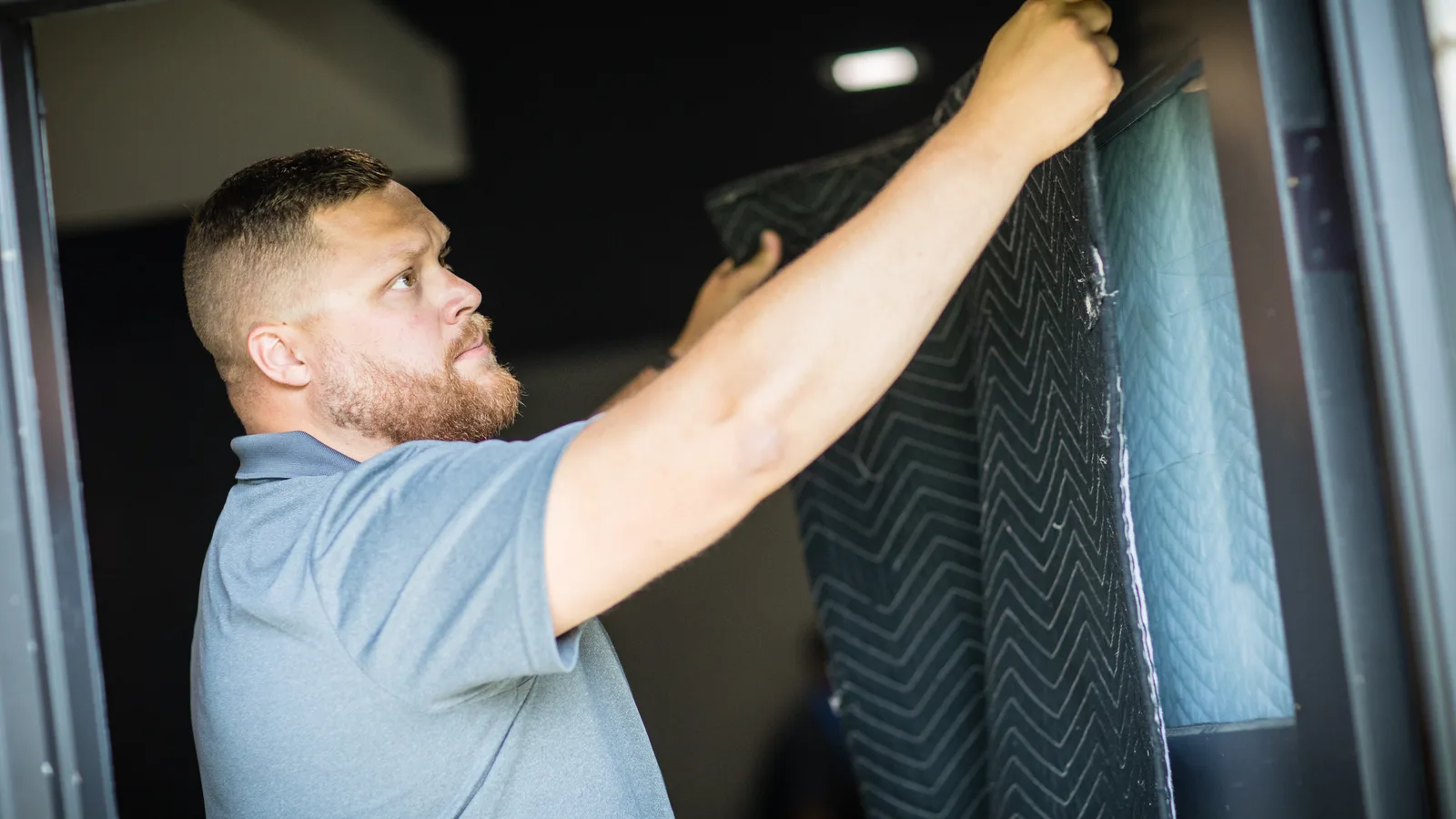 Trent mover protecting a wrapped piano for transport
